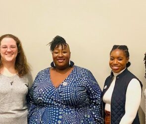 Alabama A&M student Aniah Cosby receiving a scholarship award