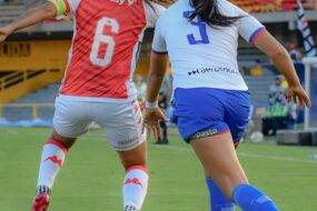 Women's Super League players in action during a match