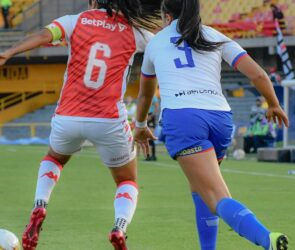 Women's Super League players in action during a match