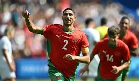 Morocco national football team celebrating a goal against Comoros at AFCON 2025