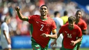 Morocco national football team celebrating a goal against Comoros at AFCON 2025