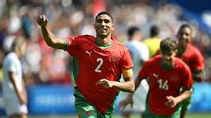 Morocco national football team celebrating a goal against Comoros at AFCON 2025