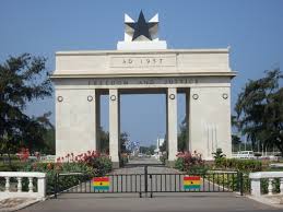 ghana flag and histrorical memorial related to slavery
