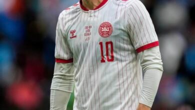 Christian Eriksen ‘conscious and doing well’ after collapsing on pitch