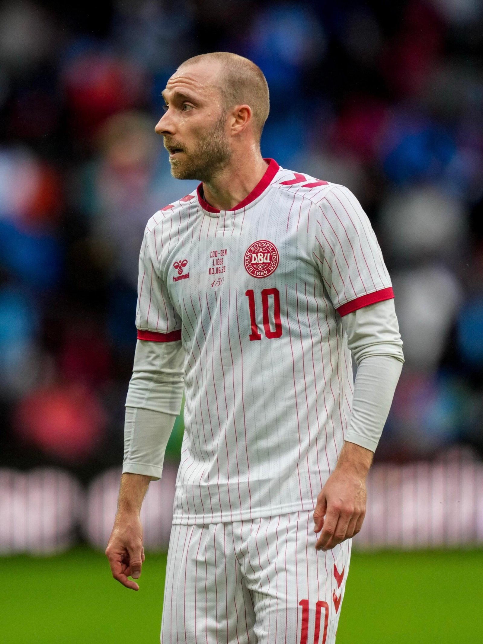 Christian Eriksen ‘conscious and doing well’ after collapsing on pitch