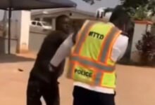 Video: Driver slaps police officer during dispute